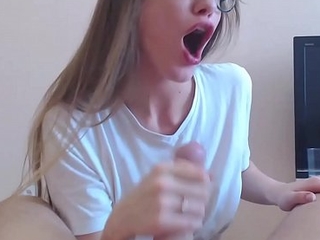 Hot teen with X glasses gives a thorough blowjob